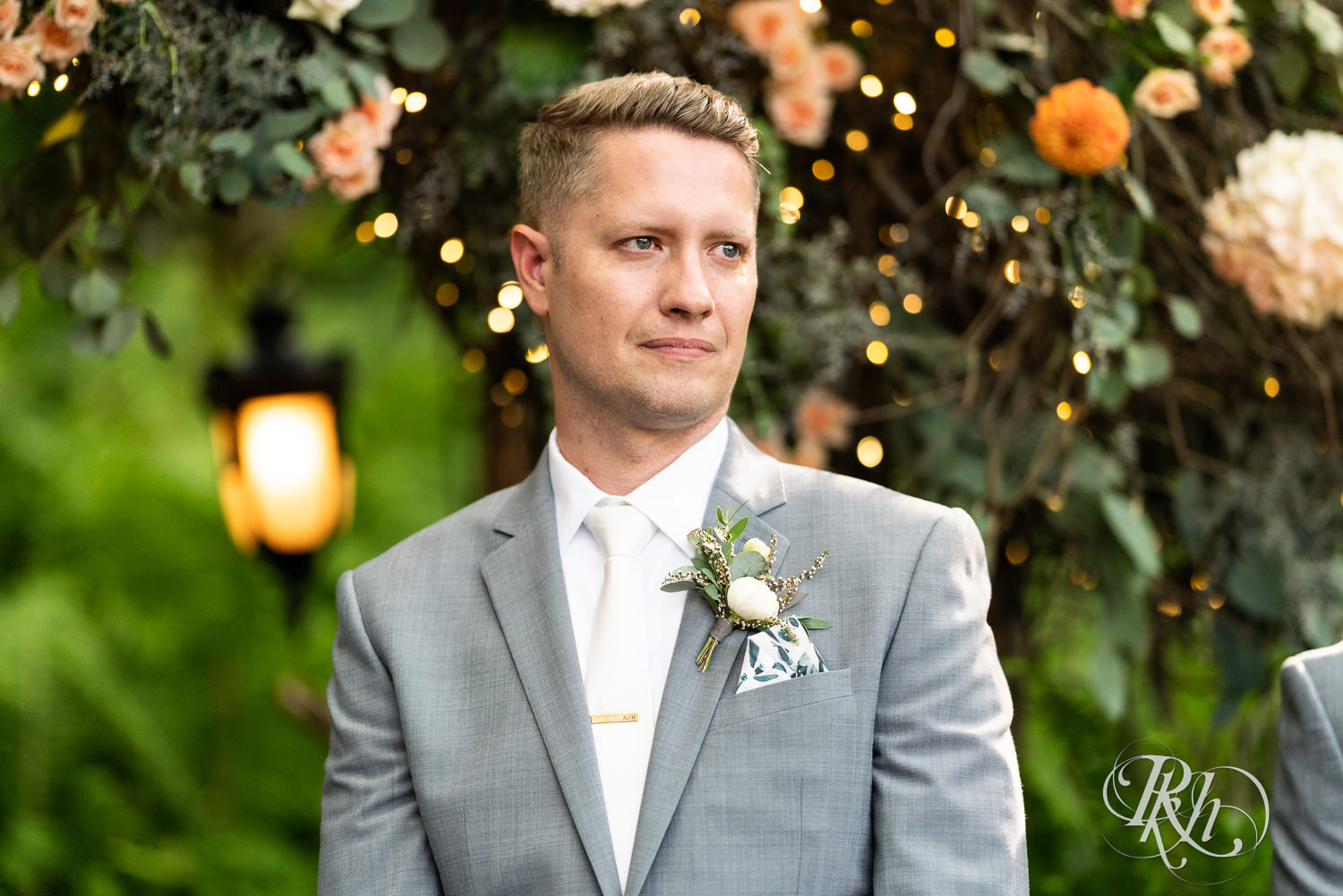 Groom crying at alter seeing bride at Camrose Hill Flower Farm in Stillwater, Minnesota.