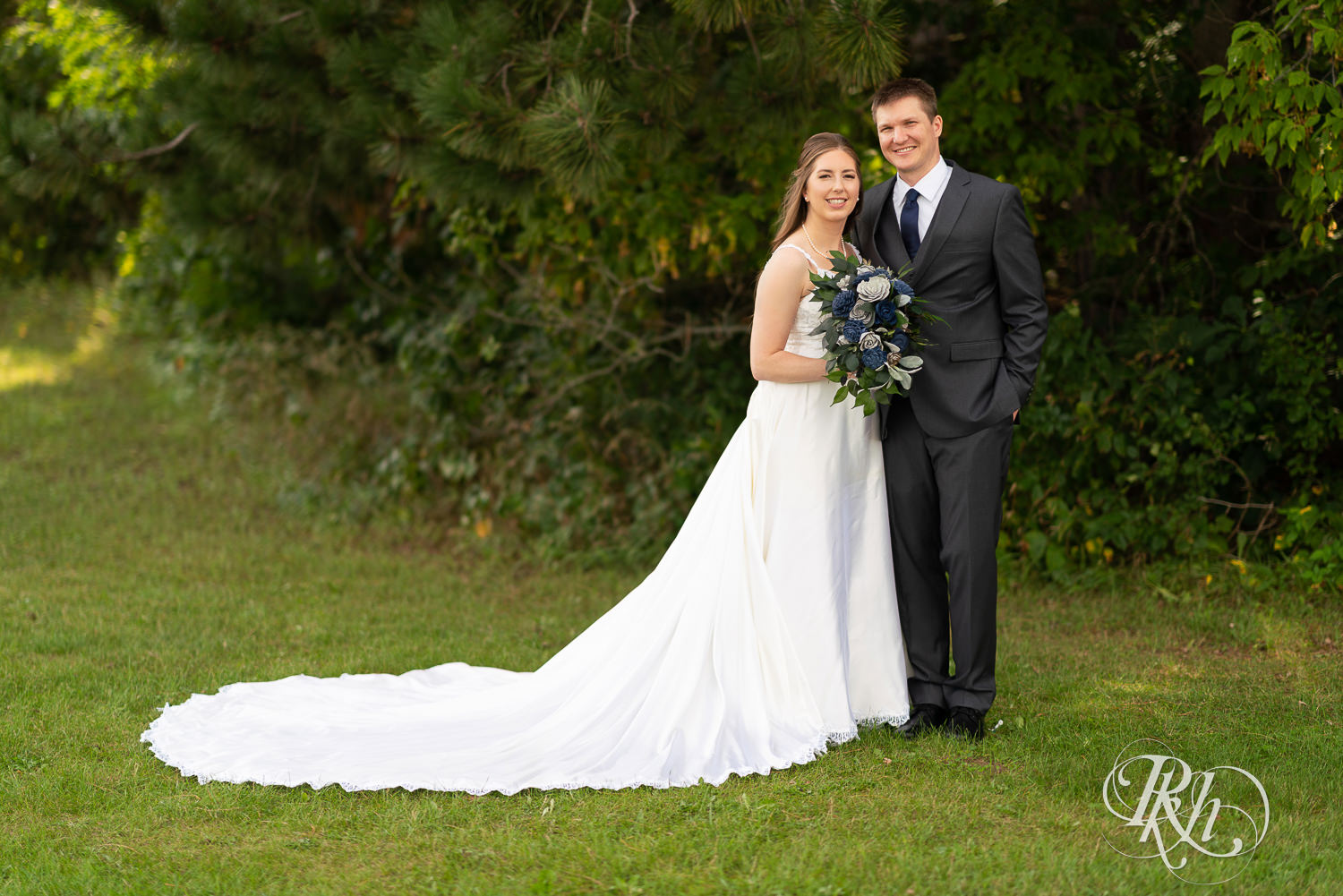 Bride and groom at a summer wedding at Stone Lion Winery and Events in Isanti, Minnesota. 