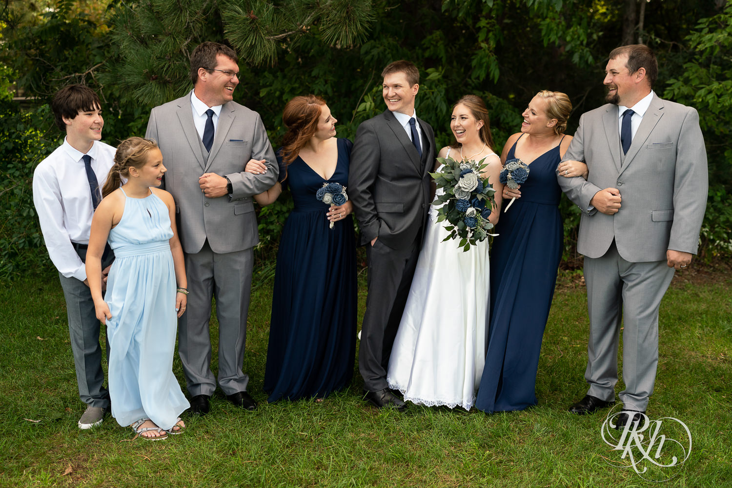 Wedding party at a summer wedding at Stone Lion Winery and Events in Isanti, Minnesota. 