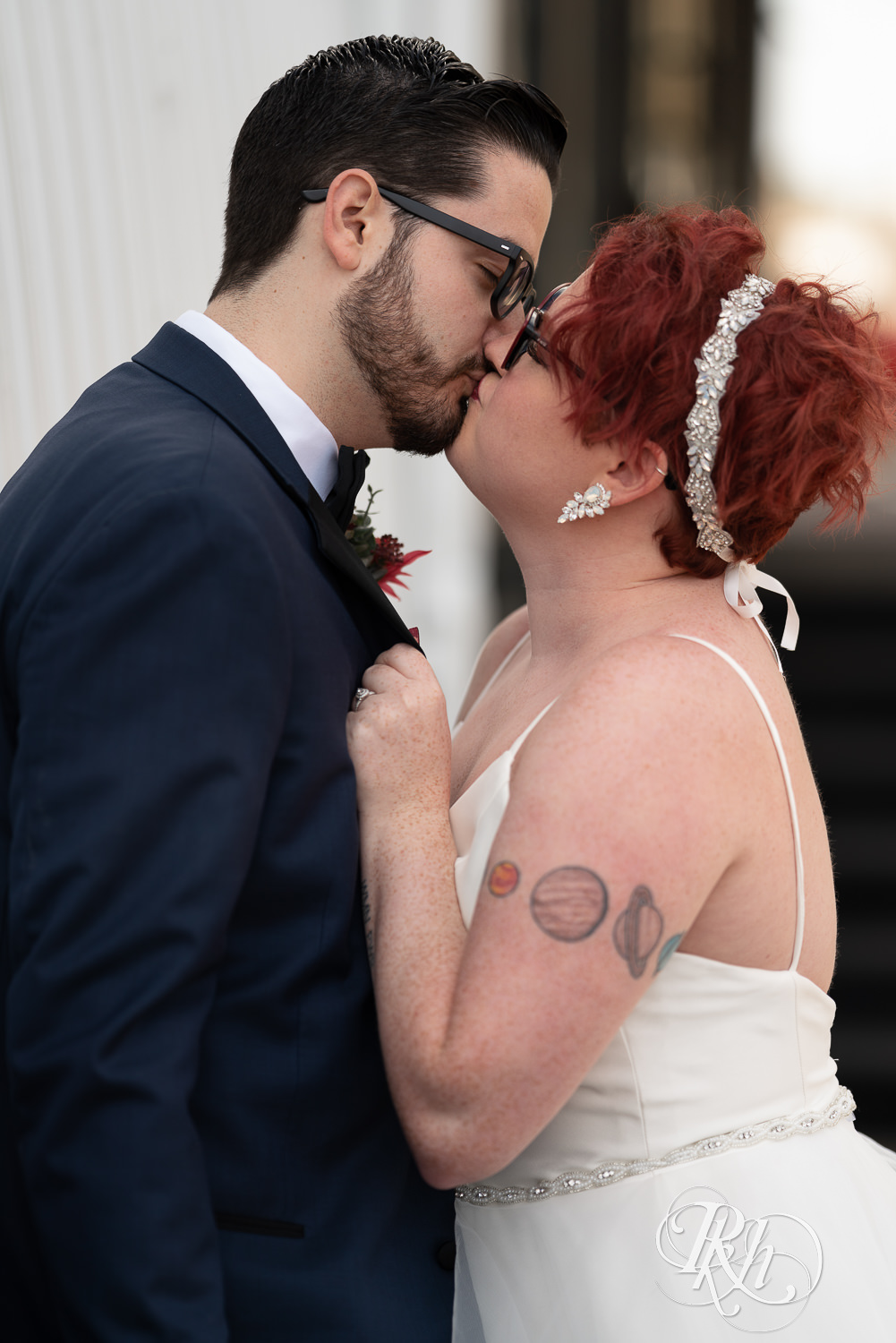 Couple kissing at The Mill Events in Chetek, Wisconsin. 