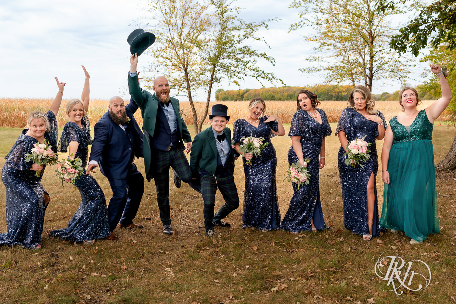 Gay wedding party posing with grooms in Belle Plaine, Minnesota.