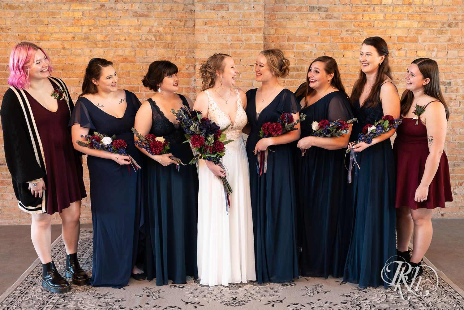 Wedding party dressed in blue at The Jerome Event Center in Delano, Minnesota.