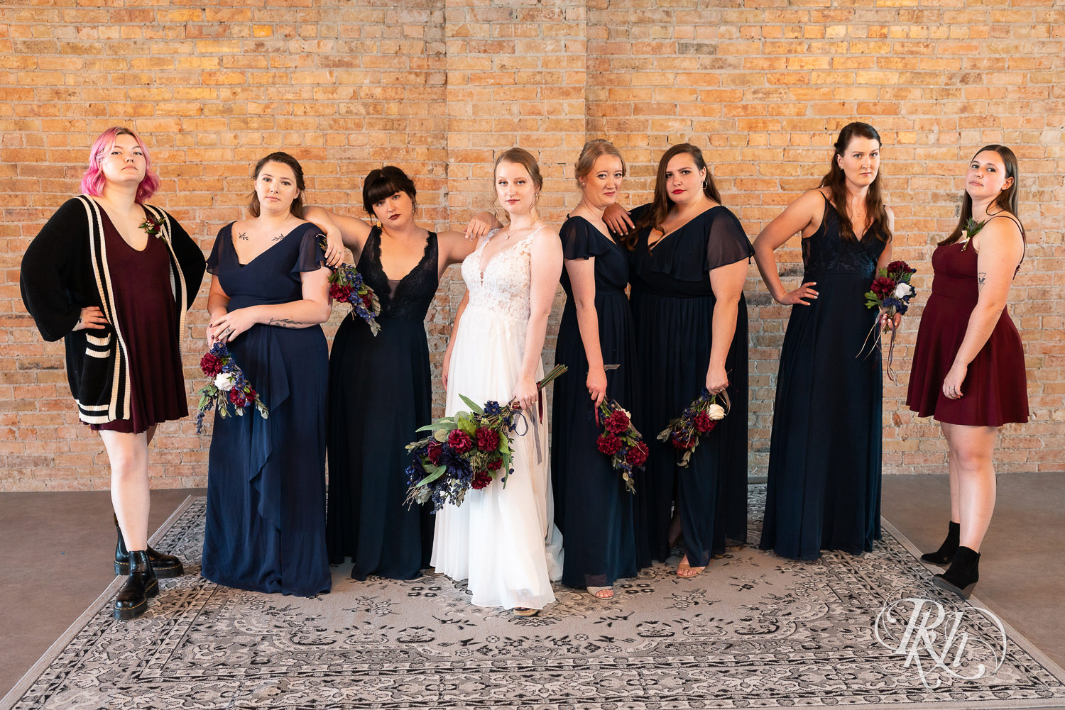 Wedding party dressed in blue at The Jerome Event Center in Delano, Minnesota.