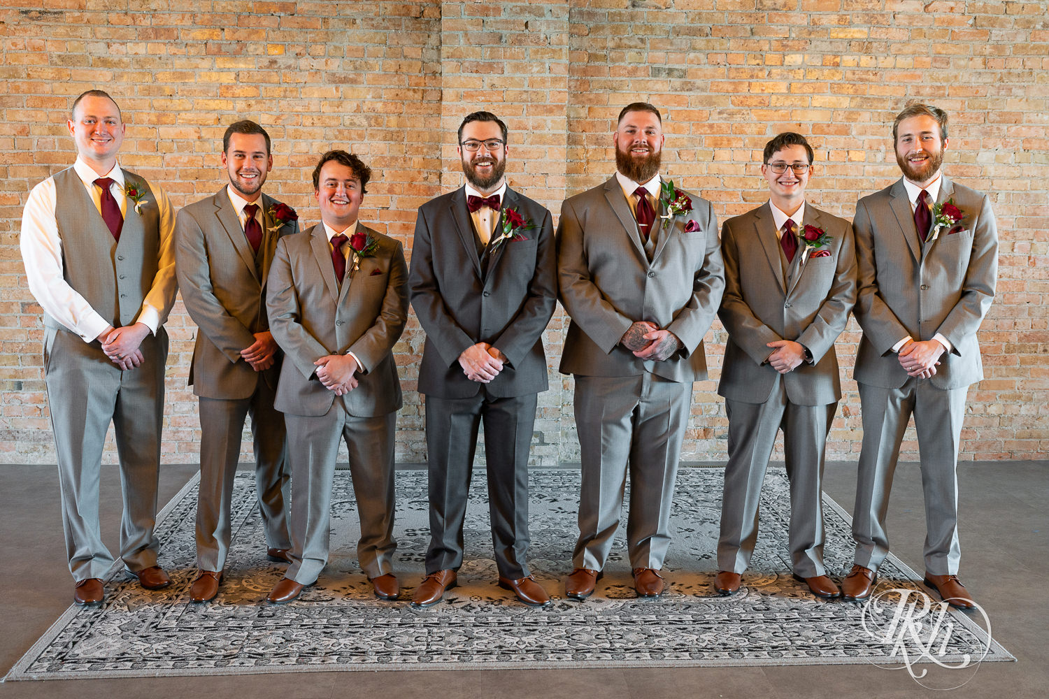 Wedding party dressed in gray at The Jerome Event Center in Delano, Minnesota.