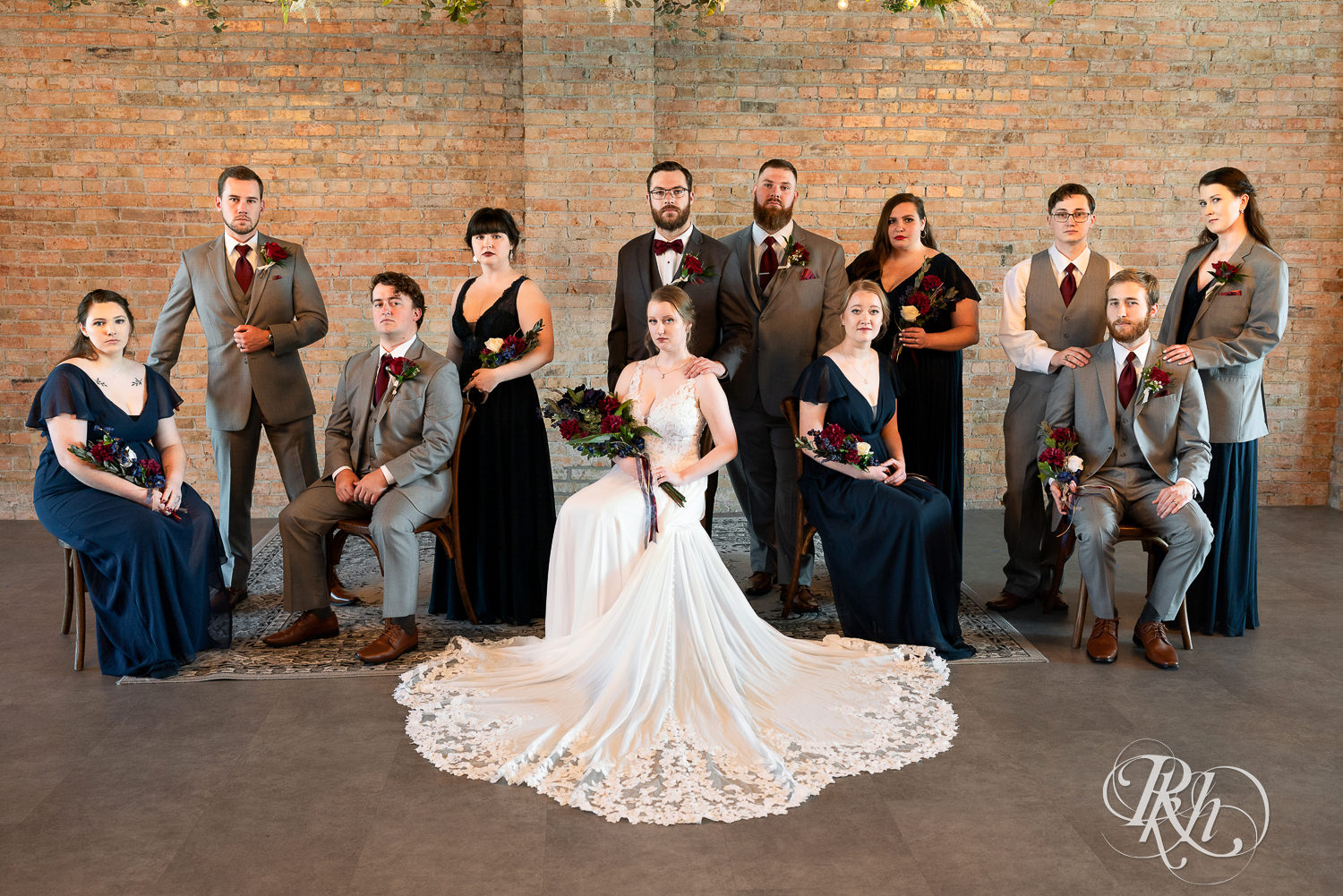 Wedding party dressed in blue and gray at The Jerome Event Center in Delano, Minnesota.