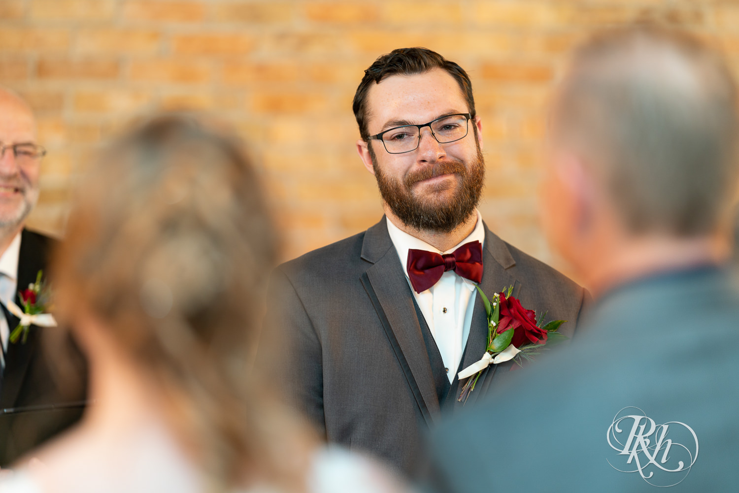 Groom crying seeing bride walking down the aisle at Jerome Event Center