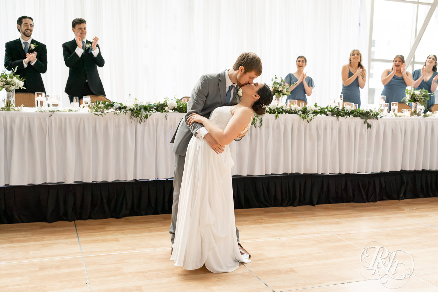 Bride and groom enter wedding reception at Doubletree Hilton Saint Paul in Saint Paul, Minnesota.