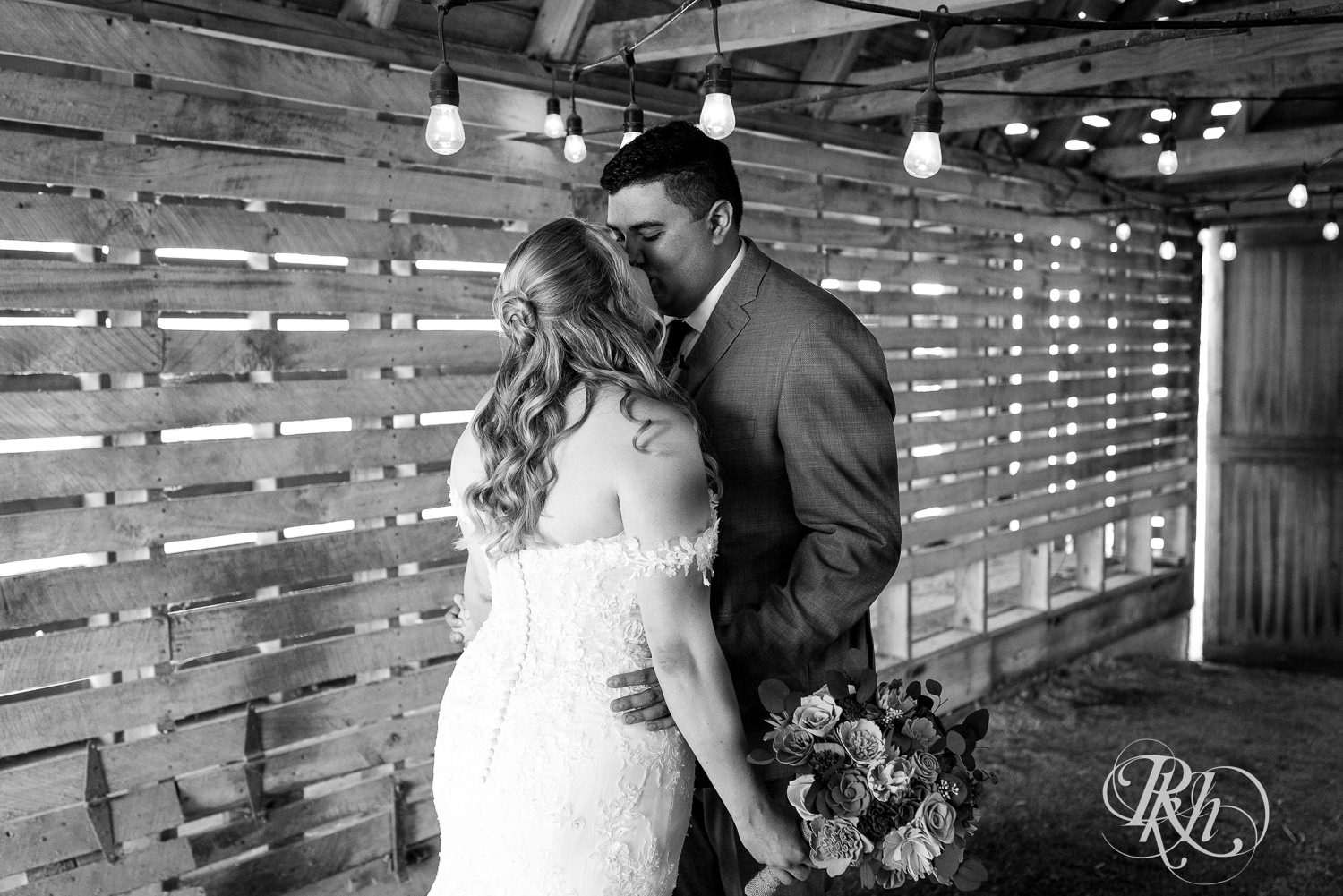 Bride and groom have first look on wedding day at Cottage Farmhouse in Glencoe, Minnesota.