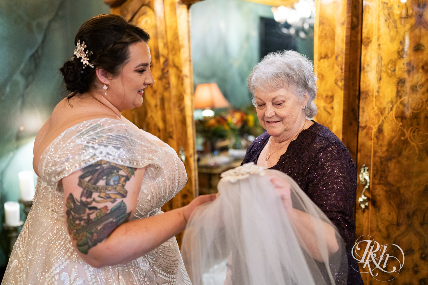 Plus size bride getting ready for wedding at Kellerman's Event Center in White Bear Lake, Minnesota.