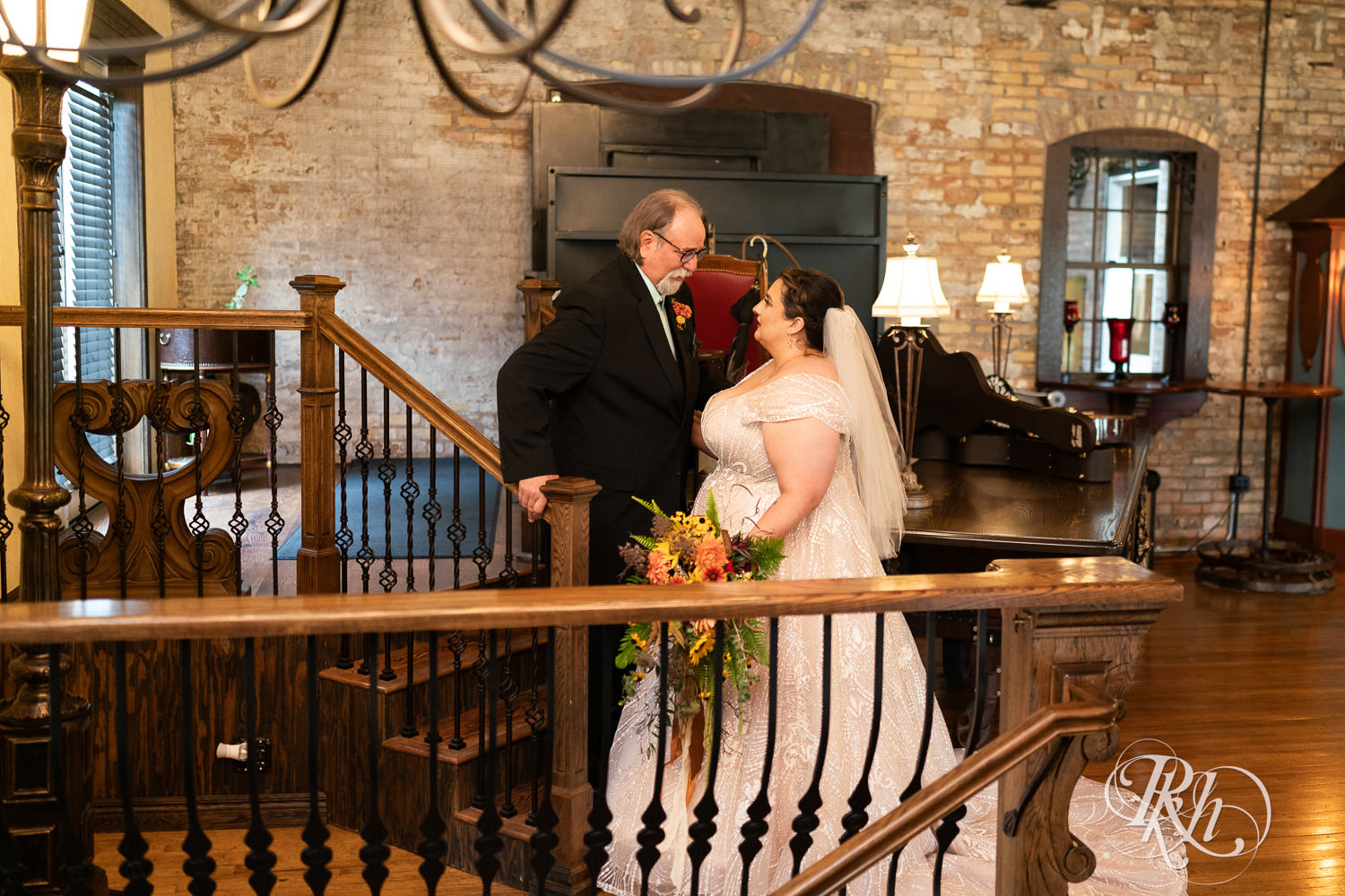 Plus size bride doing first look with dad at Kellerman's Event Center in White Bear Lake, Minnesota.