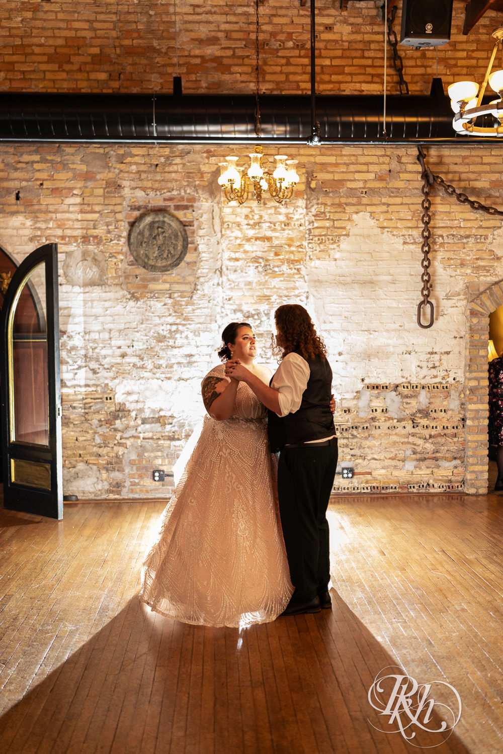Bride and groom share first dance at wedding reception at Kellerman's Event Center in White Bear Lake, Minnesota.