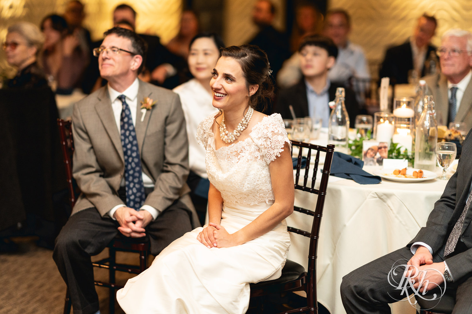 Groom sings to the bride at The Grand 1858 in Minneapolis, Minnesota.