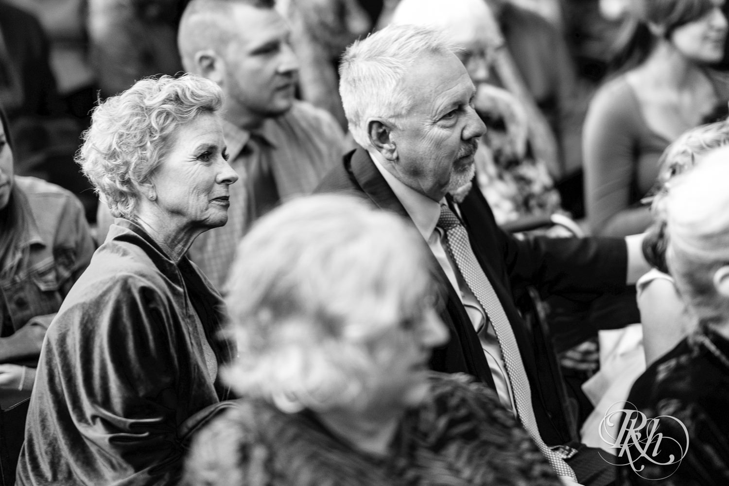Guests watch the wedding ceremony at The Grand 1858 in Minneapolis, Minnesota.
