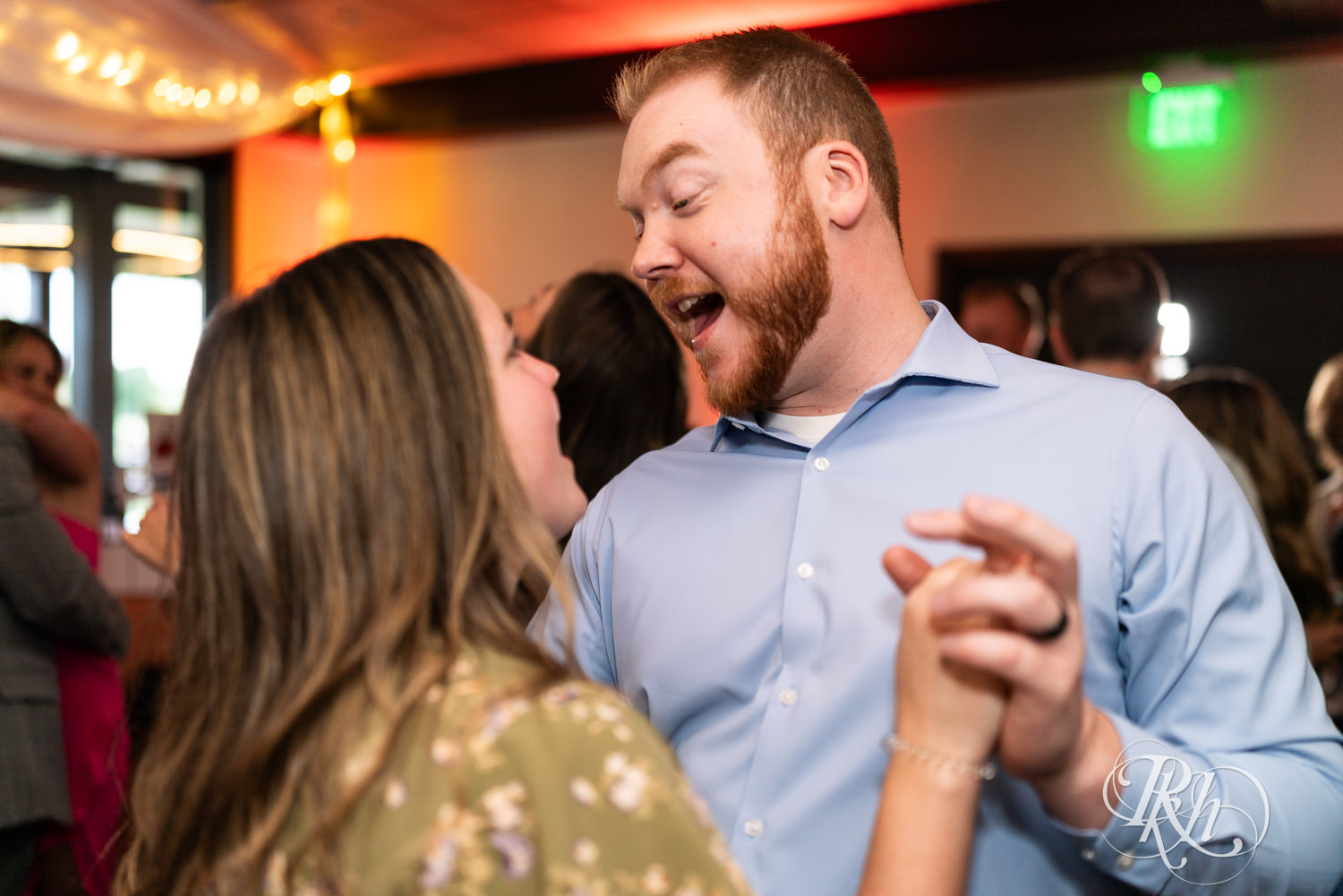 Guests dance during wedding reception at Olympic Hills Golf Club in Eden Prairie, Minnesota.