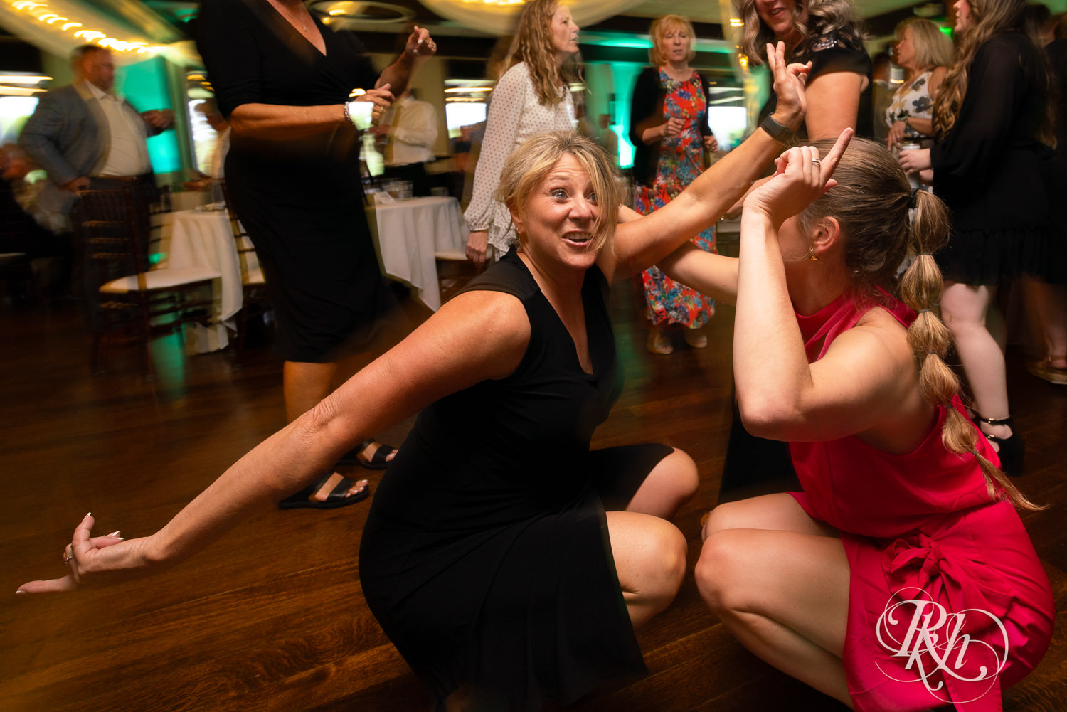 Guests dance during wedding reception at Olympic Hills Golf Club in Eden Prairie, Minnesota.