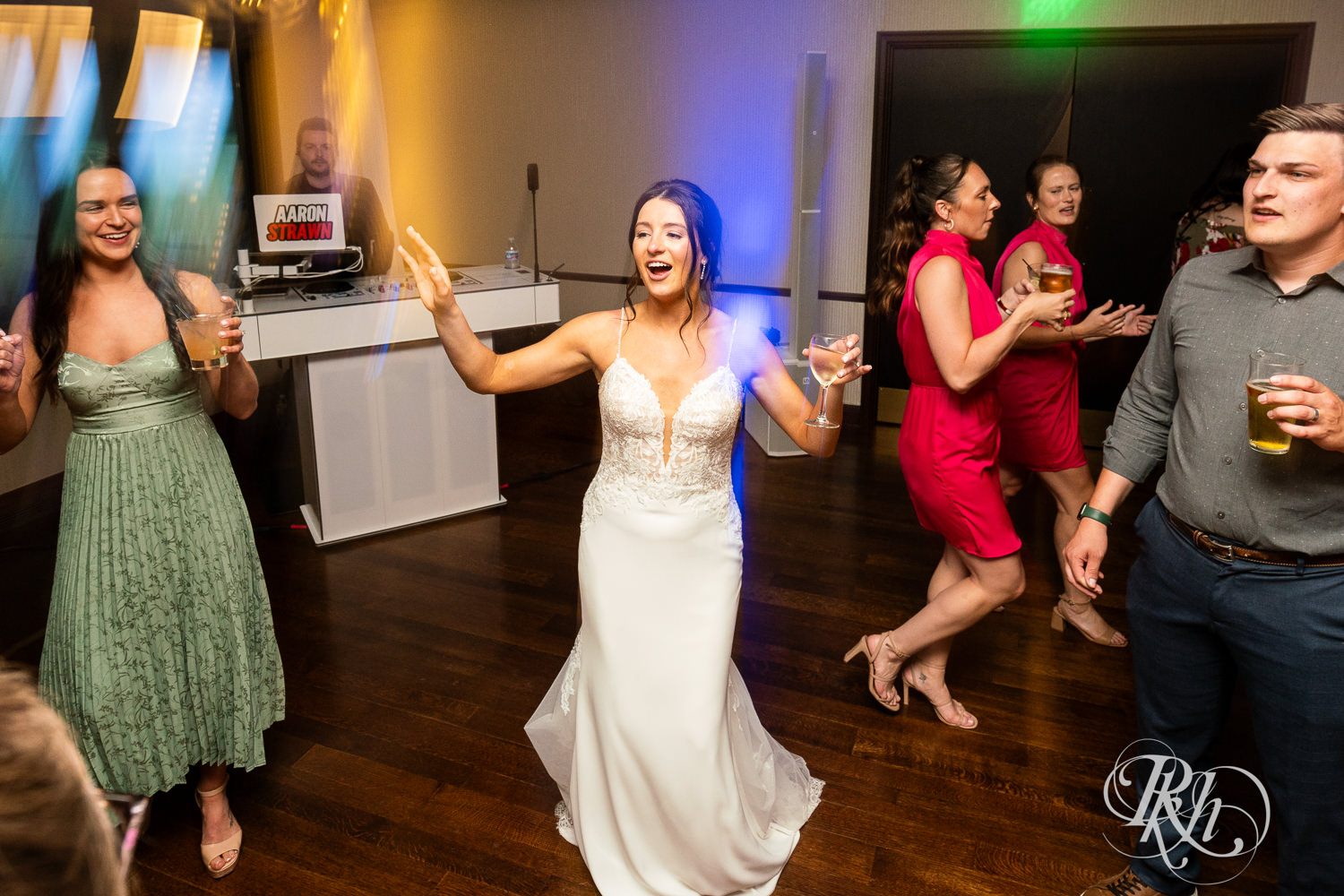 Guests dance during wedding reception at Olympic Hills Golf Club in Eden Prairie, Minnesota.