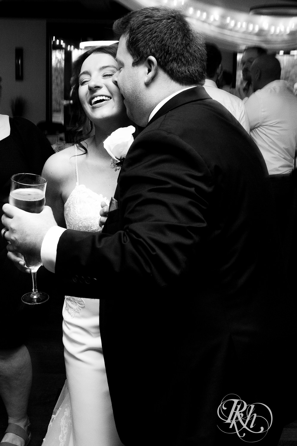 Guests dance during wedding reception at Olympic Hills Golf Club in Eden Prairie, Minnesota.