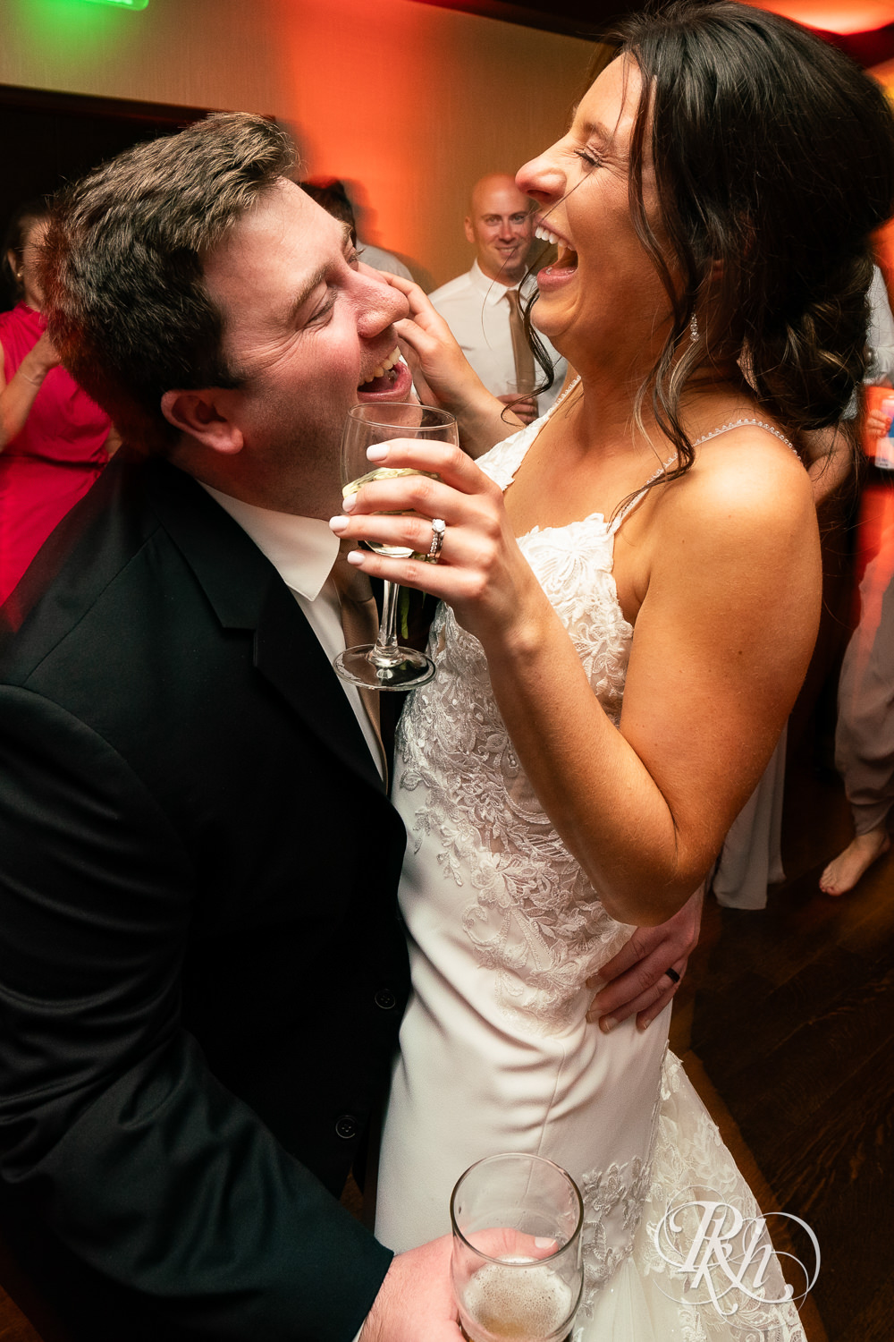 Guests dance during wedding reception at Olympic Hills Golf Club in Eden Prairie, Minnesota.