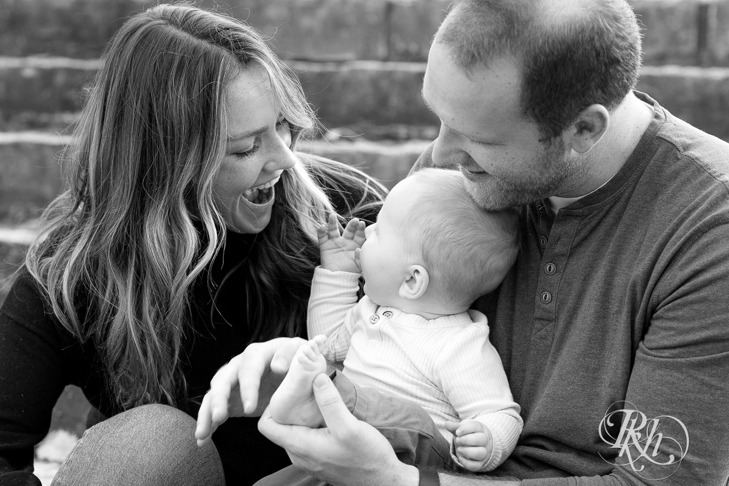  Baby smiles with mom at Irvine Park in Saint Paul, Minnesota.