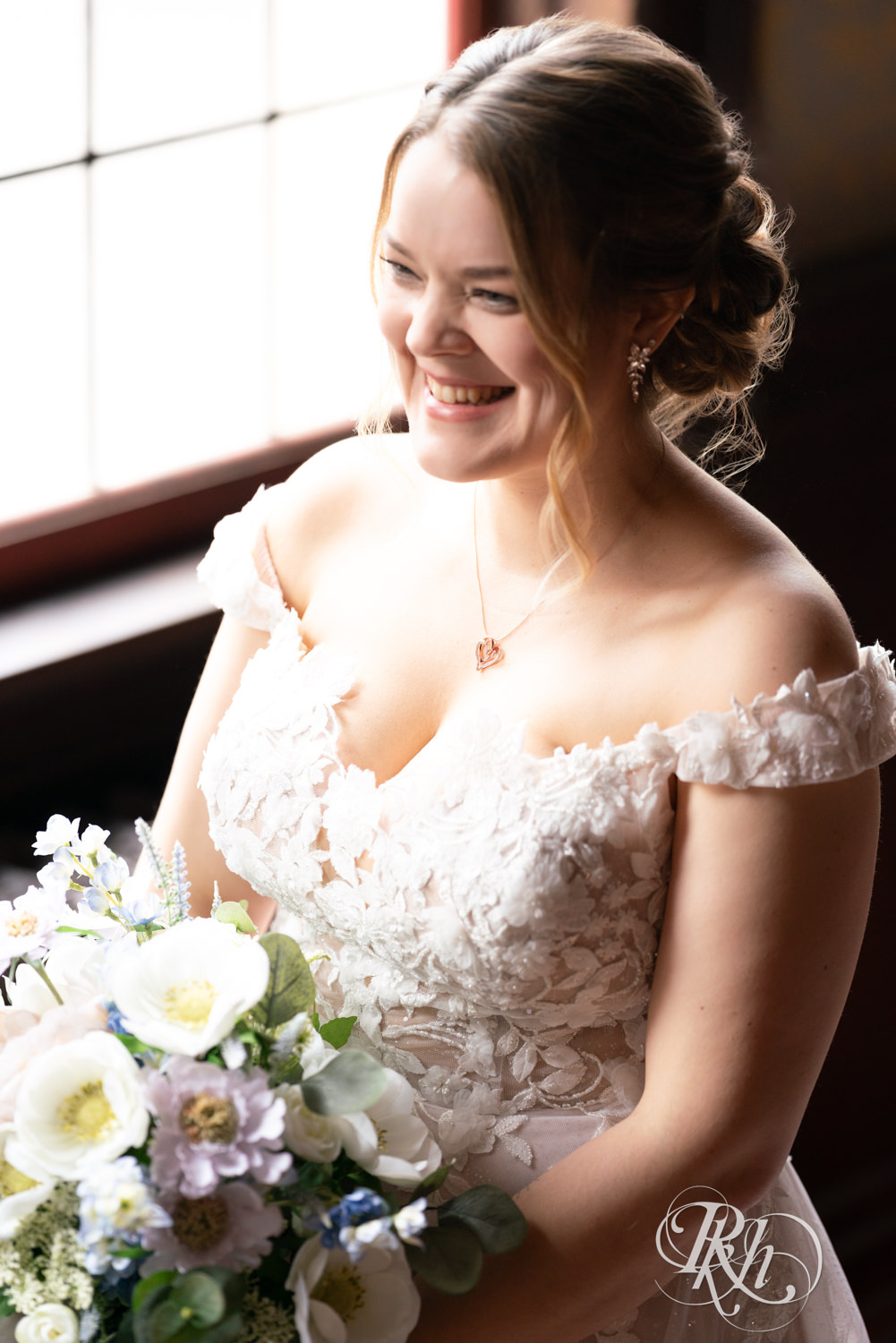 Bride and groom share first look on their wedding day at the Semple Mansion in Minneapolis, Minnesota.
