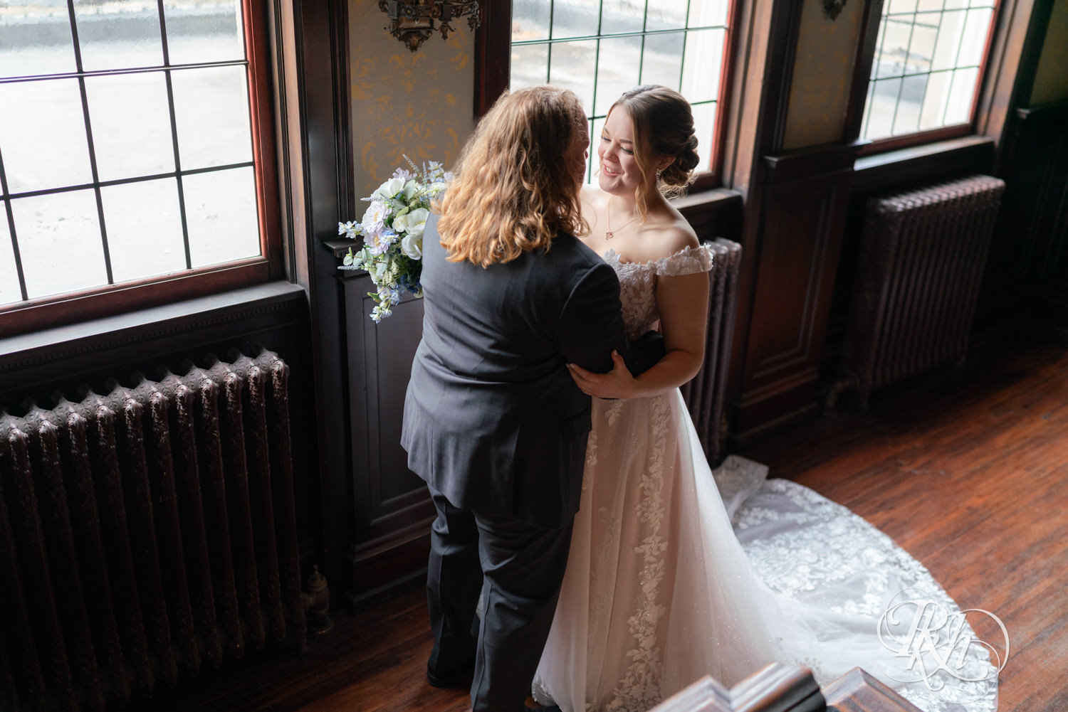 Bride and groom share first look on their wedding day at the Semple Mansion in Minneapolis, Minnesota.