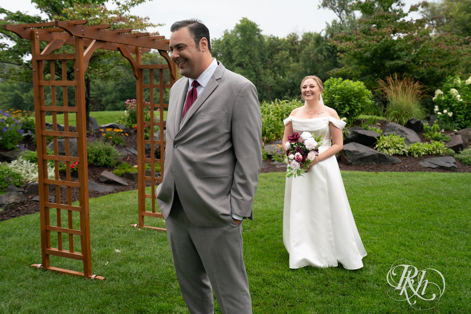 Bride and groom do a first look at Dellwood Country Club in Dellwood, Minnesota.