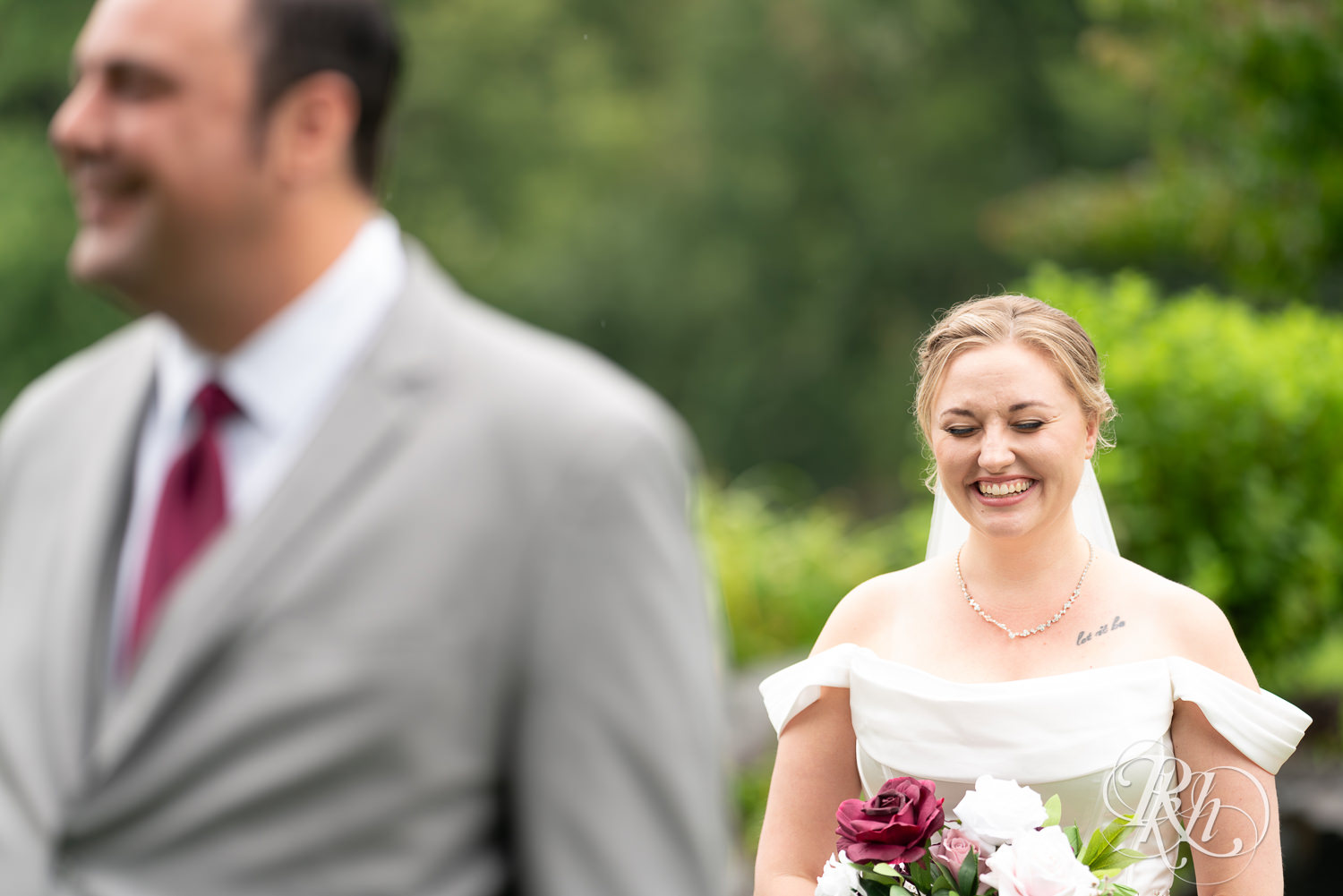 Bride and groom do a first look at Dellwood Country Club in Dellwood, Minnesota.