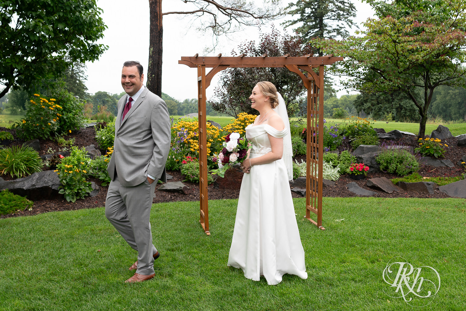 Bride and groom do a first look at Dellwood Country Club in Dellwood, Minnesota.
