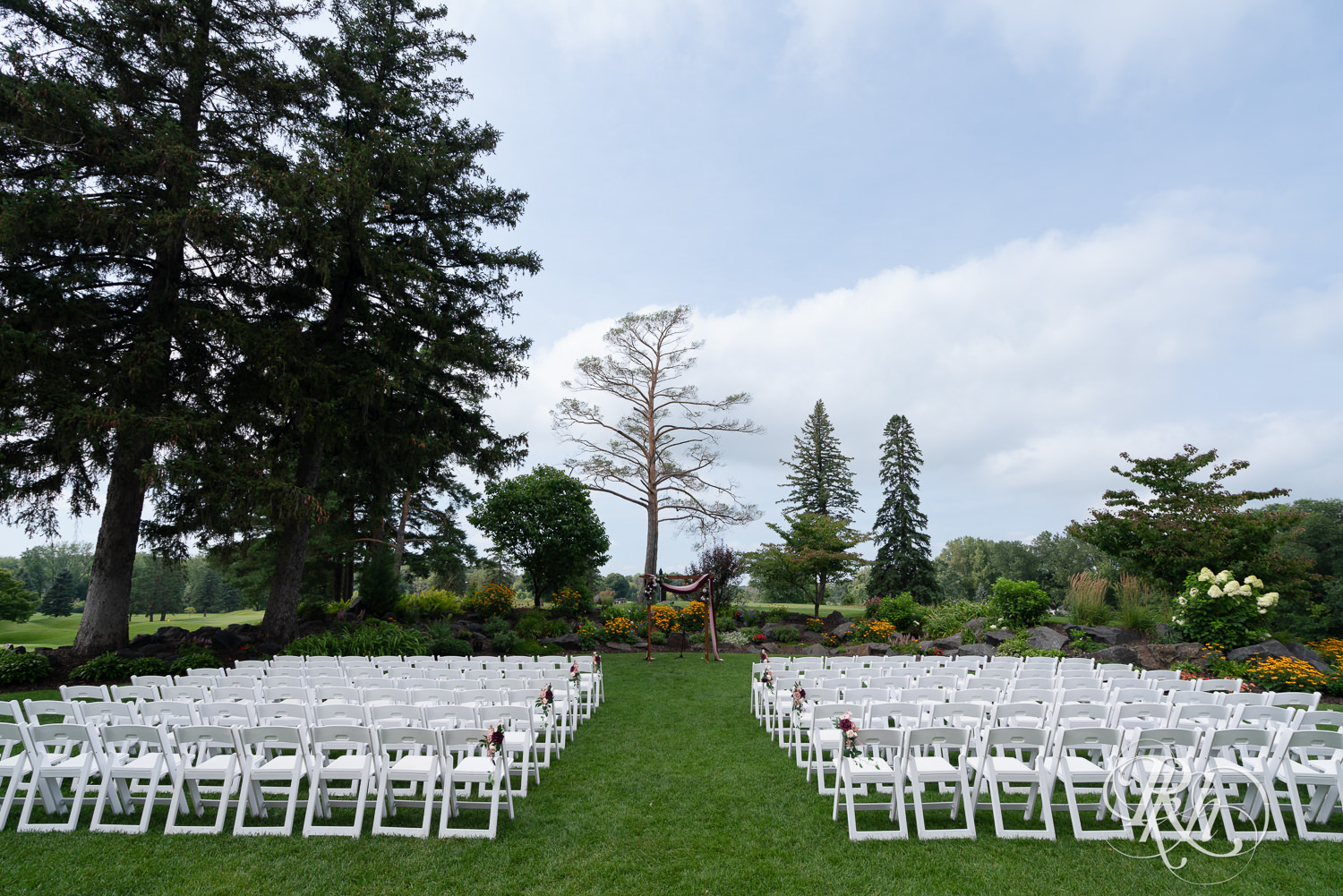 Outdoor wedding ceremony site at Dellwood Country Club in Dellwood, Minnesota.